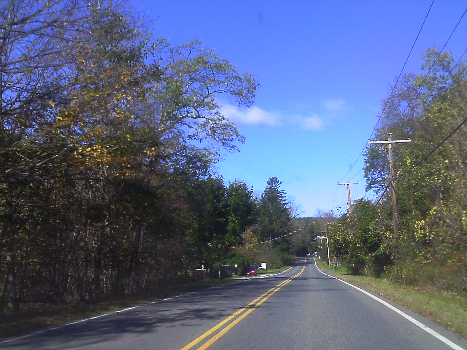 Route 71 heading westbound through Alford, Massachusetts, with the Taconic Range visible in the distance.
