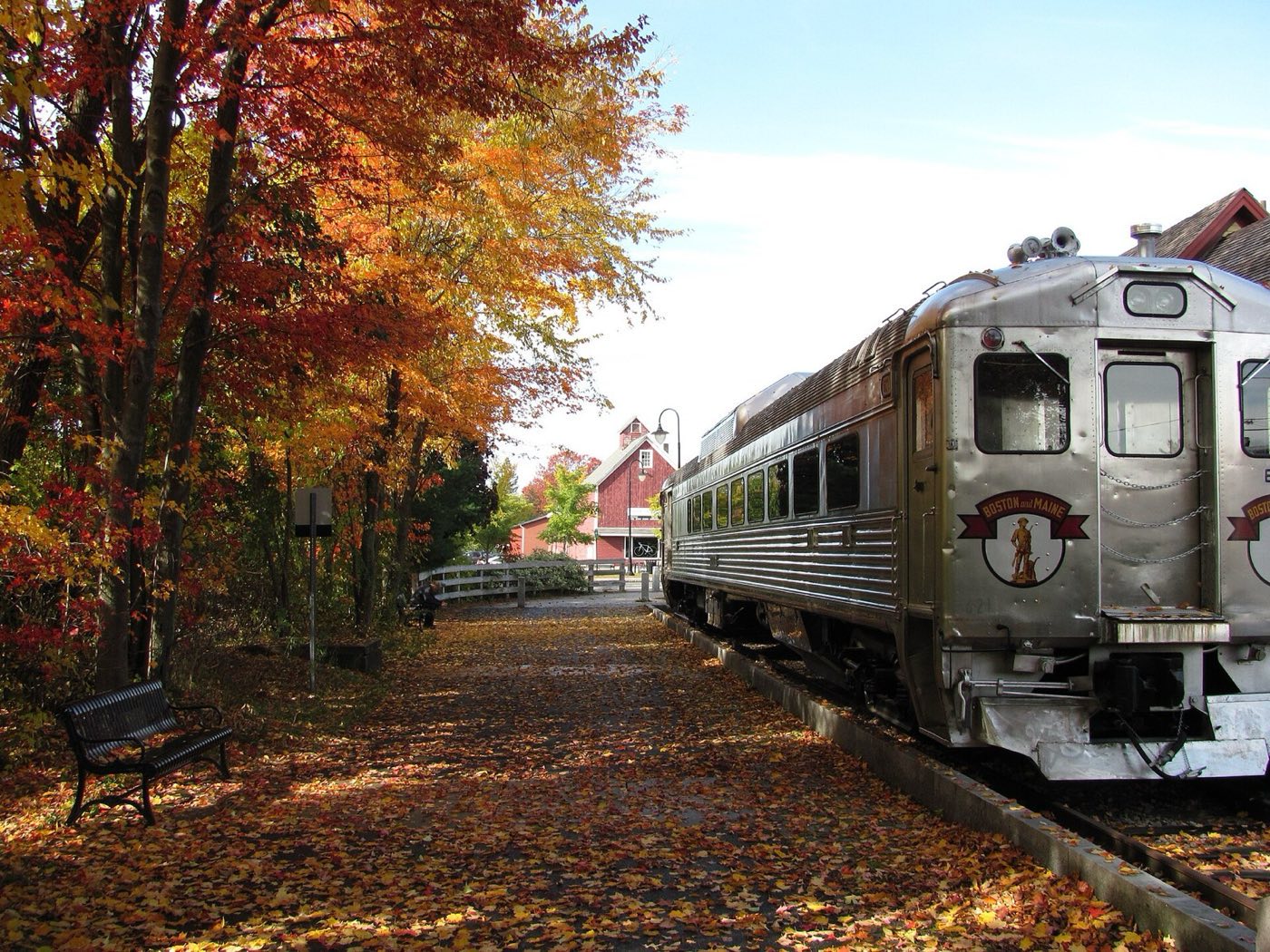 A restored Boston and Maine steam locomotive on display at Bedford Depot Park.