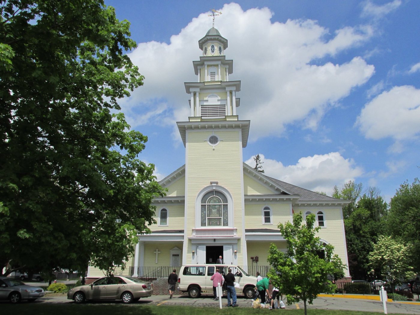 Christ Church United, the historic "Old Yellow Meeting House," at the intersection of Route 38 and Route 113 in Dracut, Massachusetts.