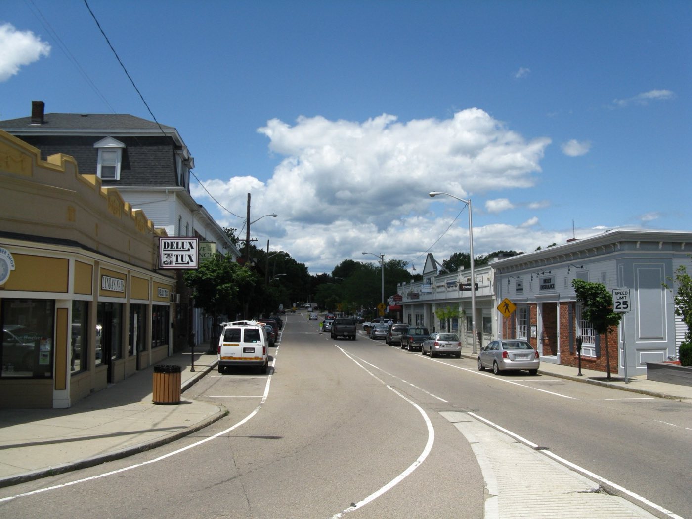 Main Street in downtown Franklin, Massachusetts, lined with storefronts.