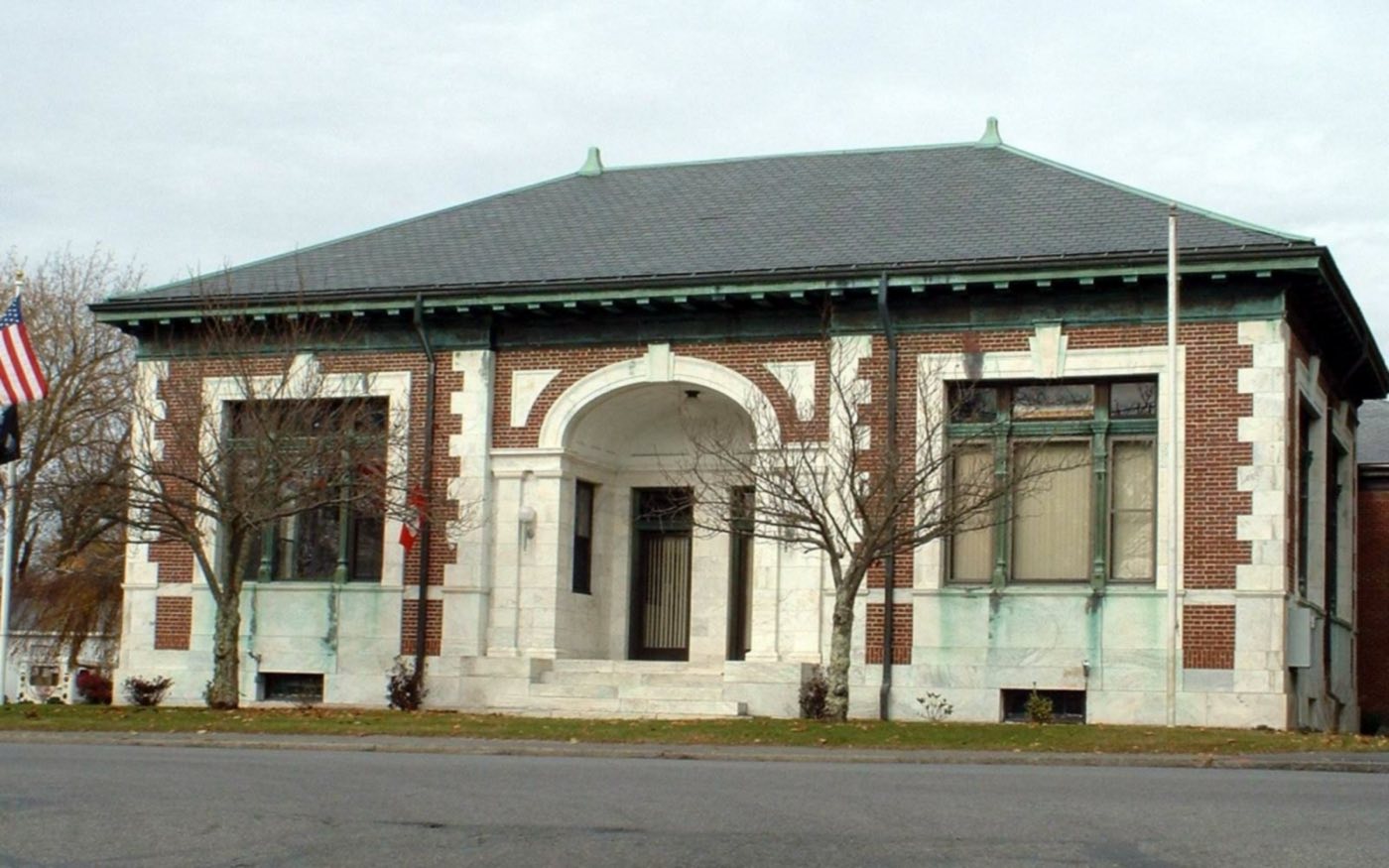 Harwich Town Hall, a white New England-style municipal building.