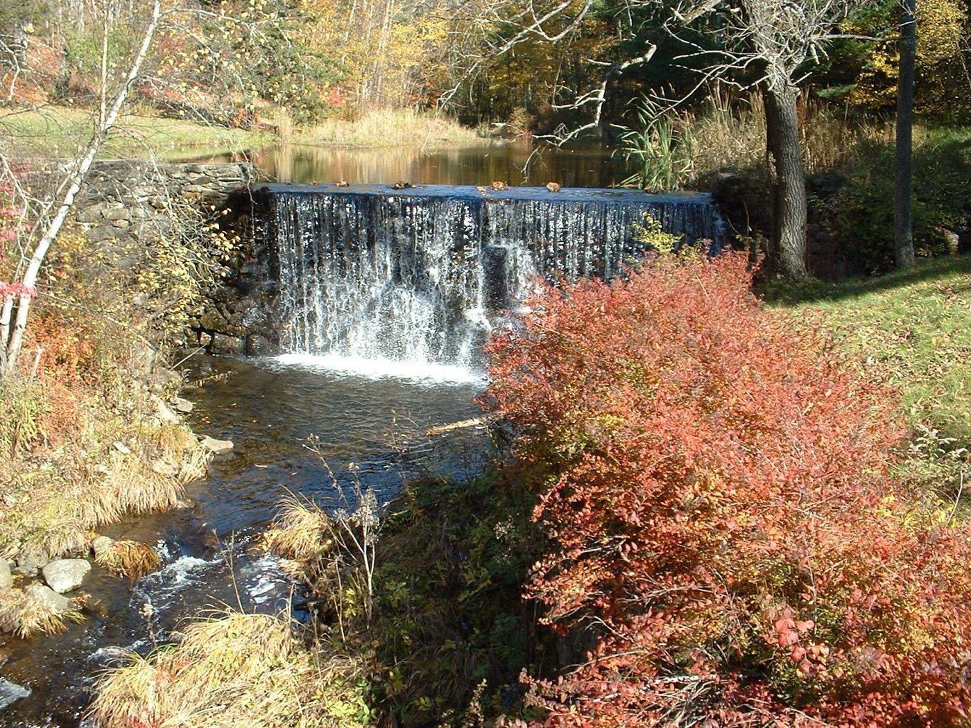 The Dell Dam waterfall on Heath Brook in the village of Dell, Heath, Massachusetts, in autumn.