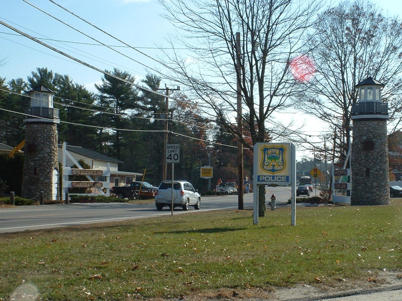 The stone lighthouse-tower "Gateway to Cape Cod" entrance marker on Cranberry Highway in Wareham, Massachusetts.