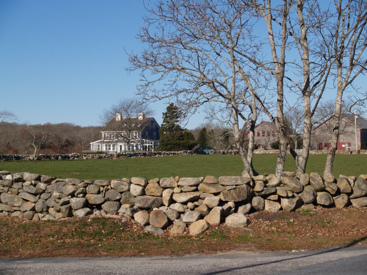 A stone wall and field in Westport, Massachusetts.